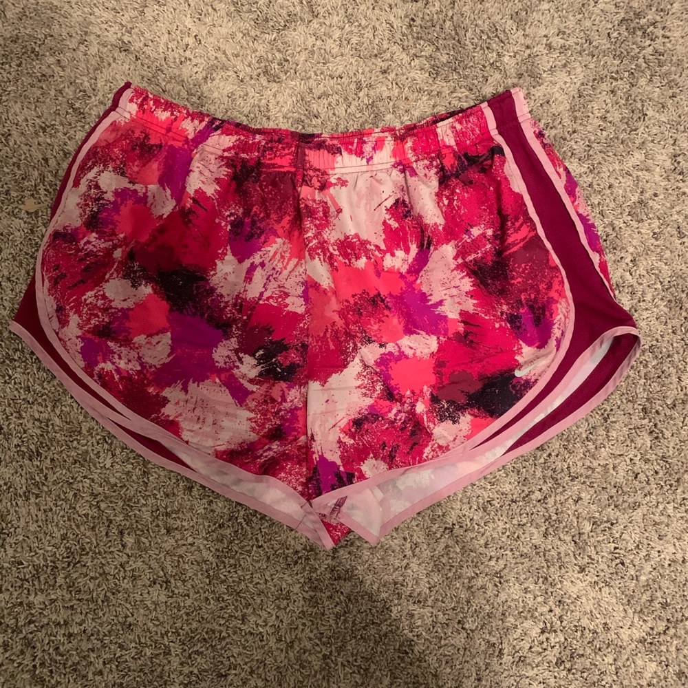 Pink patterned Nike Dri-Fit shorts